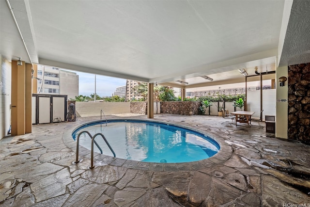 1561 Kanunu St Unit 801, Honolulu, HI 96814 - indoor pool featuring a patio and a fenced backyard
