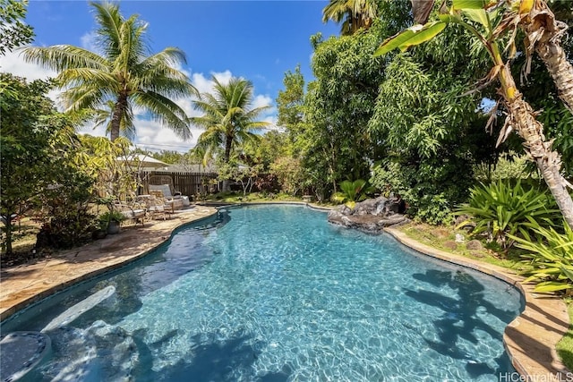 pool featuring fence