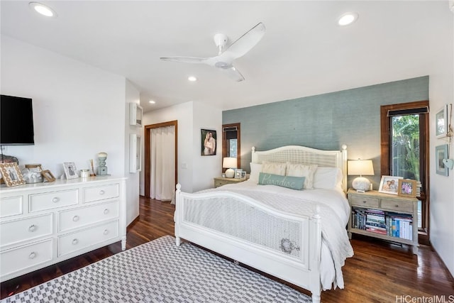 bedroom featuring ceiling fan, dark wood-style flooring, and recessed lighting