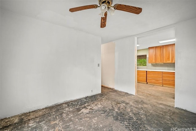 unfurnished living room featuring a ceiling fan