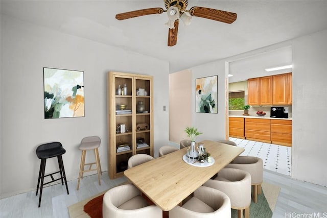 dining area featuring a ceiling fan