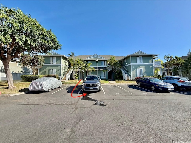 91-1058 Kekuilani Loop Unit 1502, Kapolei, HI 96707 - multi unit property with uncovered parking and a residential view
