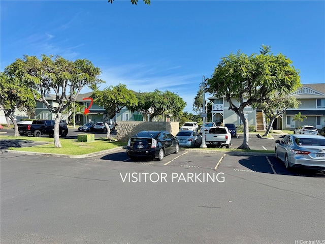 91-1058 Kekuilani Loop Unit 1502, Kapolei, HI 96707 - view of asphalt street with curbs and a residential view