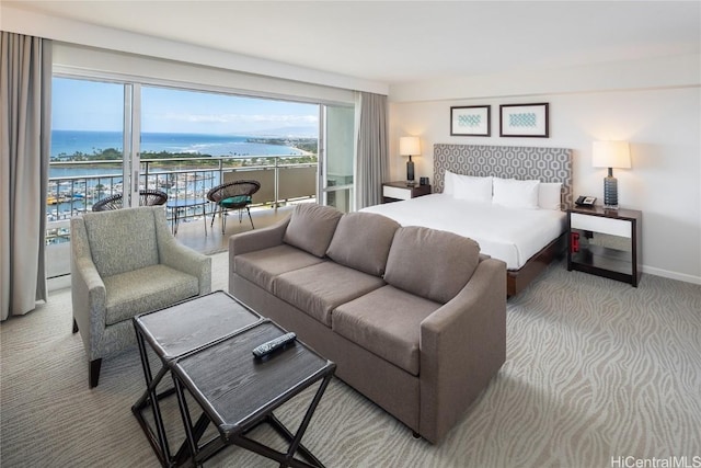 1777 Ala Moana Blvd Unit 2208, Honolulu, HI 96815 - bedroom featuring a water view, access to exterior, light carpet, and baseboards