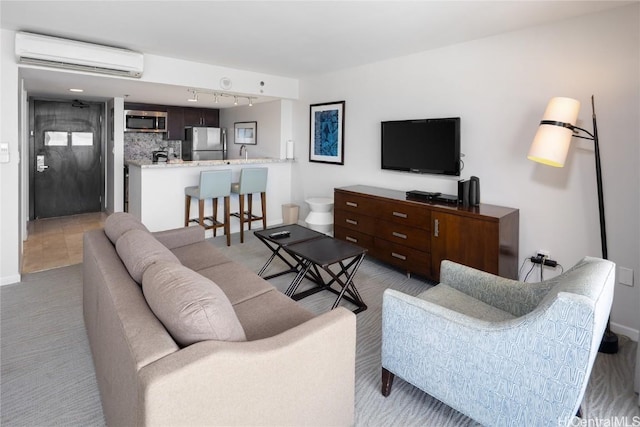 1777 Ala Moana Blvd Unit 2208, Honolulu, HI 96815 - living room with a wall mounted air conditioner and track lighting