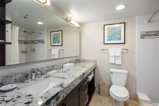 1777 Ala Moana Blvd Unit 2208, Honolulu, HI 96815 - bathroom featuring toilet, recessed lighting, vanity, tiled shower, and tile patterned floors