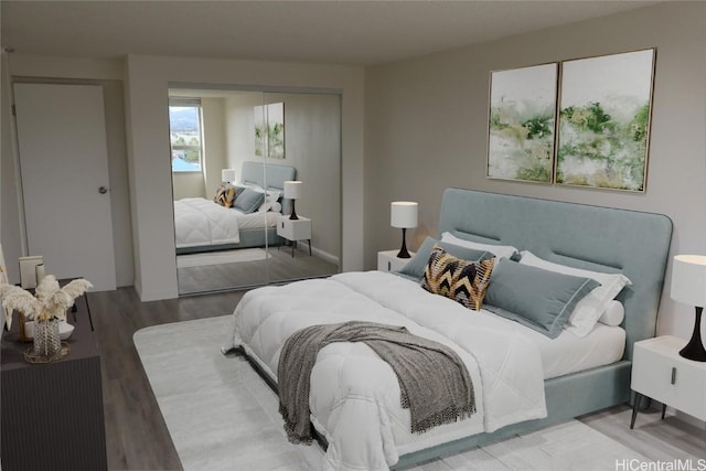 1060 Kamehameha Hwy Unit 702A, Pearl City, HI 96782 - bedroom featuring a closet and wood finished floors