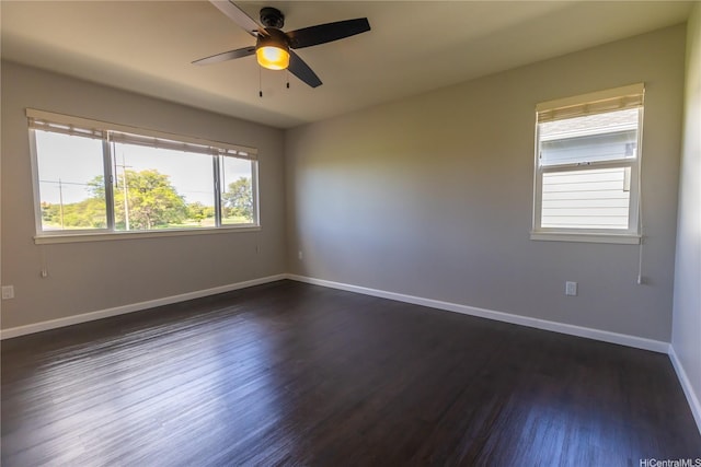 91-1159 Kamakana St Unit 542, Ewa Beach, HI 96706 - spare room with dark wood-style flooring, a ceiling fan, and baseboards