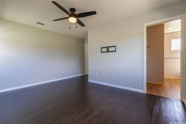 91-1159 Kamakana St Unit 542, Ewa Beach, HI 96706 - spare room with ceiling fan, dark wood-type flooring, and baseboards