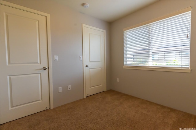 91-1159 Kamakana St Unit 542, Ewa Beach, HI 96706 - unfurnished bedroom with carpet flooring