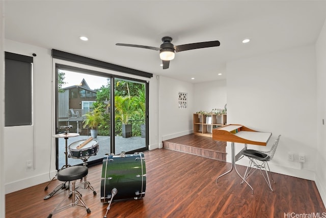 interior space featuring baseboards, ceiling fan, wood finished floors, and recessed lighting