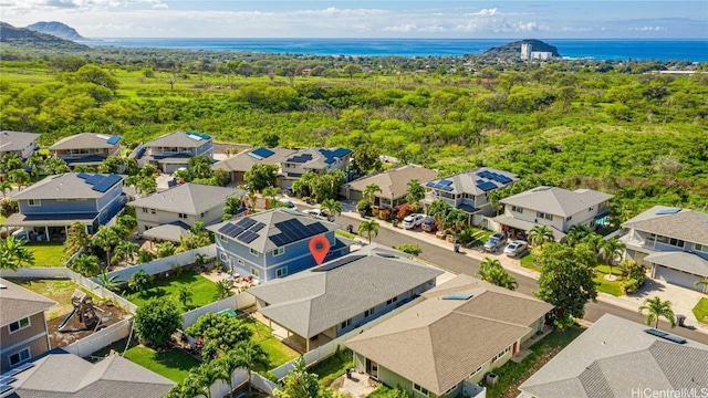 bird's eye view featuring a water view, a residential view, and a view of trees