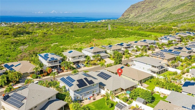 bird's eye view with a water view and a residential view