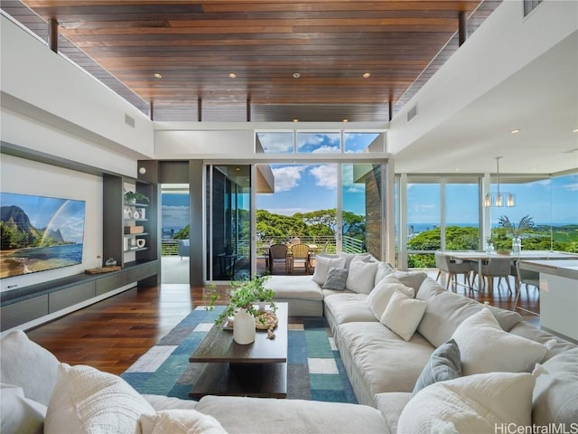 sunroom with wooden ceiling and visible vents