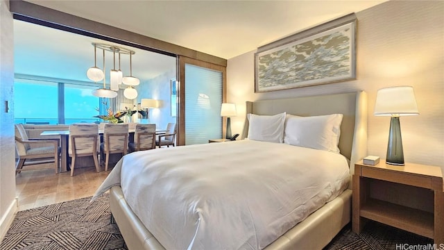 bedroom featuring wood finished floors