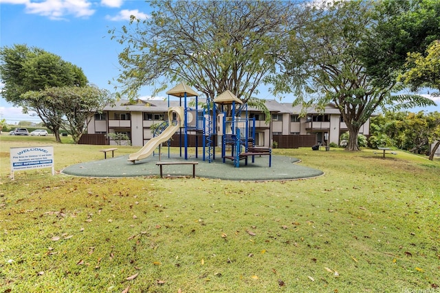 community playground featuring a yard