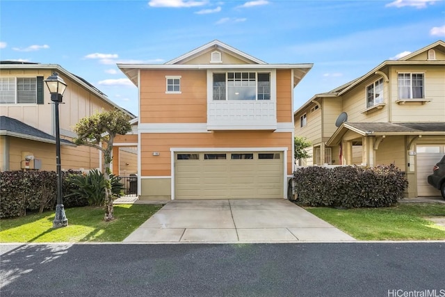 view of front of home with concrete driveway and a garage