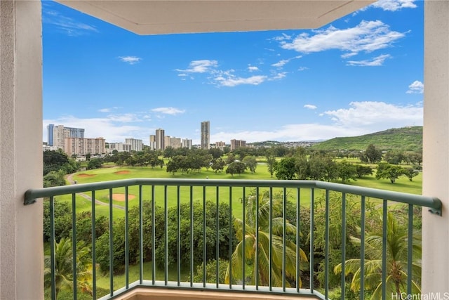 balcony featuring a city view