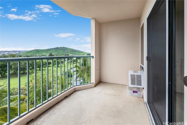 balcony featuring a mountain view