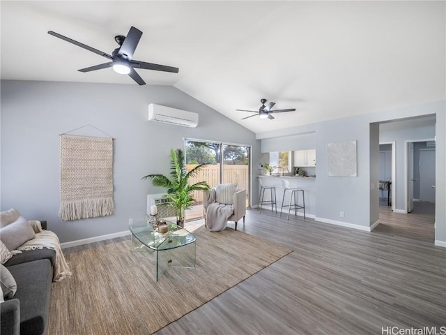 living room featuring a wall unit AC, a ceiling fan, baseboards, vaulted ceiling, and dark wood-style floors