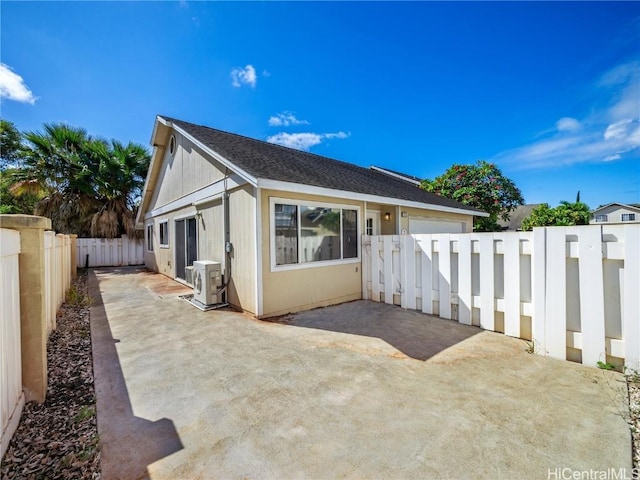 view of home's exterior with ac unit, a patio area, and a fenced backyard