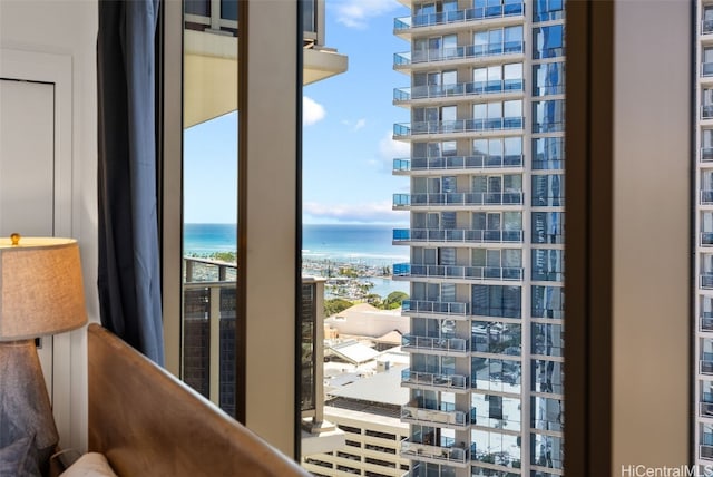 interior space featuring a water view and a view of city