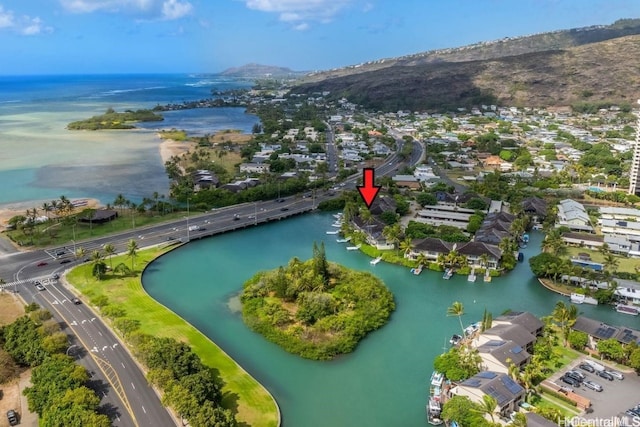 birds eye view of property featuring a water view