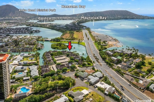 bird's eye view with a water and mountain view