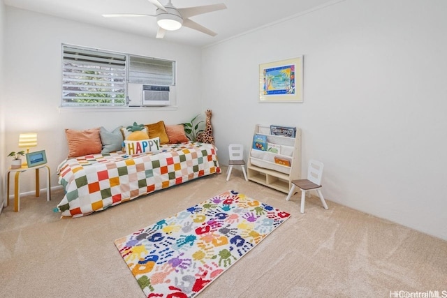 carpeted bedroom with cooling unit and ceiling fan