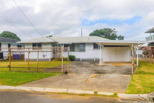 ranch-style house featuring concrete driveway, a fenced front yard, an attached carport, central air condition unit, and a front lawn