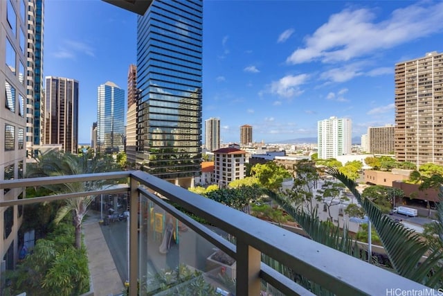 balcony featuring a city view