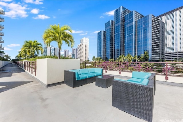 view of patio featuring a view of city and outdoor lounge area