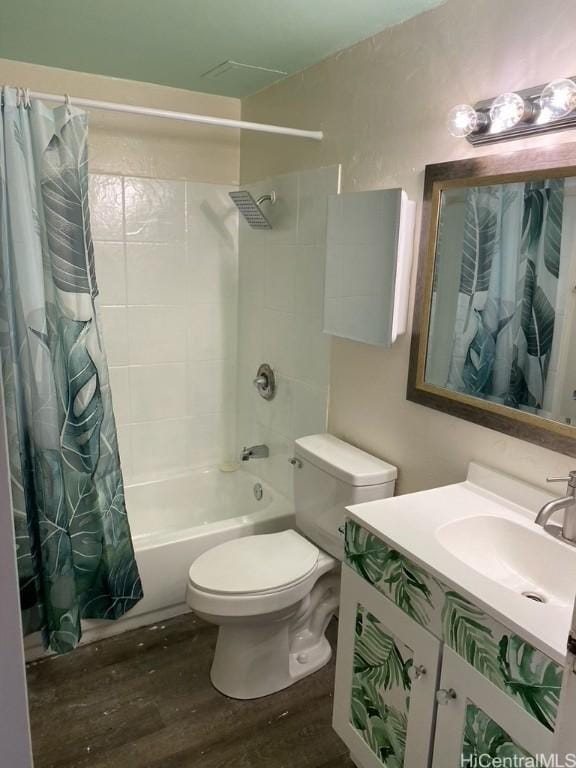 bathroom with shower / bath combo, vanity, toilet, and wood finished floors