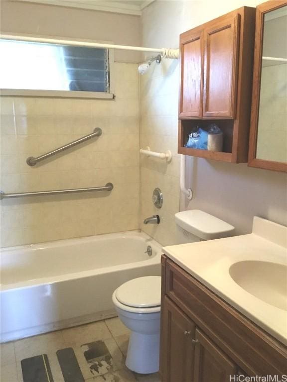 full bathroom featuring tub / shower combination, vanity, toilet, and tile patterned floors