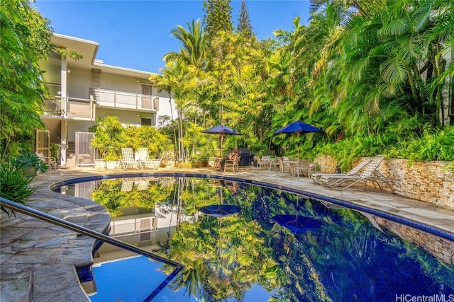 pool with a patio area