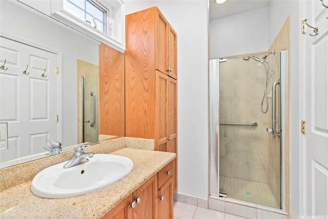 92-1277 Hauone St, Kapolei, HI 96707 - full bathroom with a shower stall, vanity, and tile patterned flooring