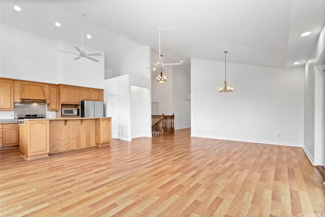 92-1277 Hauone St, Kapolei, HI 96707 - kitchen with appliances with stainless steel finishes, a chandelier, light countertops, open floor plan, and recessed lighting