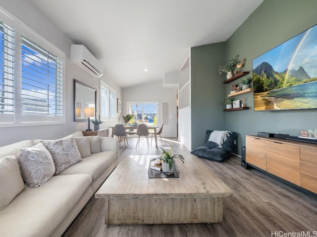 living area featuring lofted ceiling, dark wood-style flooring, and a wall mounted air conditioner