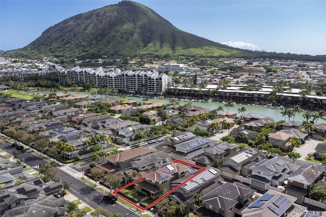 bird's eye view featuring a residential view and a water and mountain view