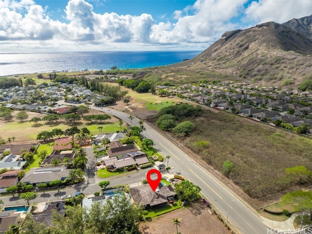 bird's eye view featuring a water view and a residential view