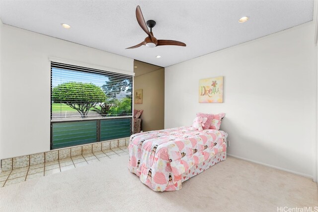 carpeted bedroom with a textured ceiling, baseboards, a ceiling fan, and recessed lighting