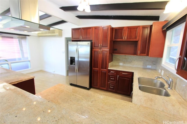 kitchen with lofted ceiling with beams, decorative backsplash, a sink, island range hood, and stainless steel fridge with ice dispenser