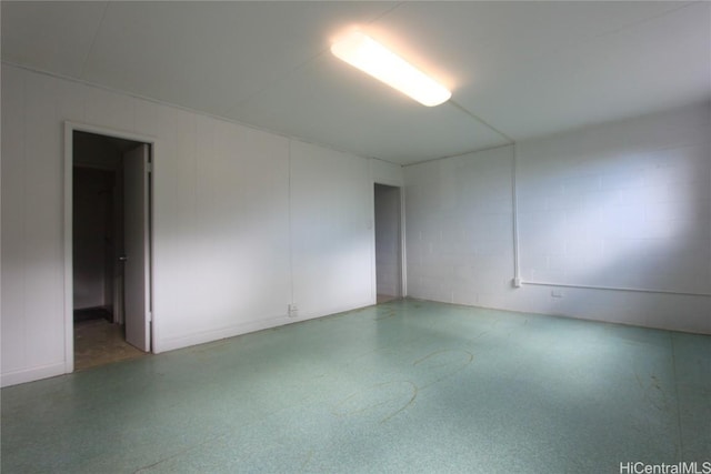 empty room with concrete block wall