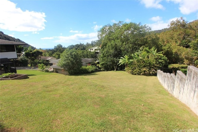 view of yard featuring fence