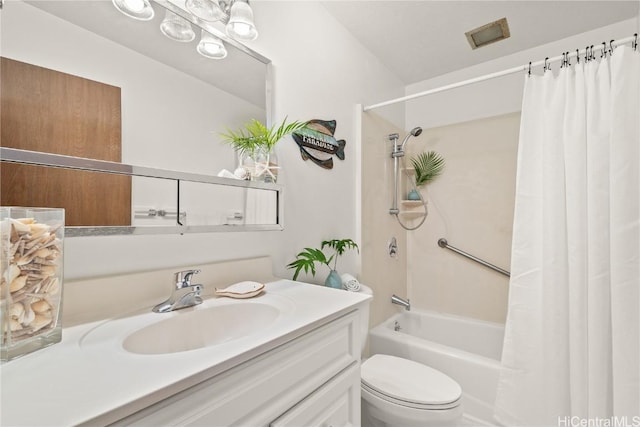 bathroom featuring shower / tub combo, vanity, and toilet