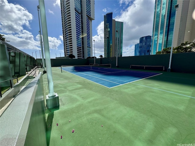 88 Piikoi St Unit 1802, Honolulu, HI 96814 - view of tennis court featuring a view of city and fence