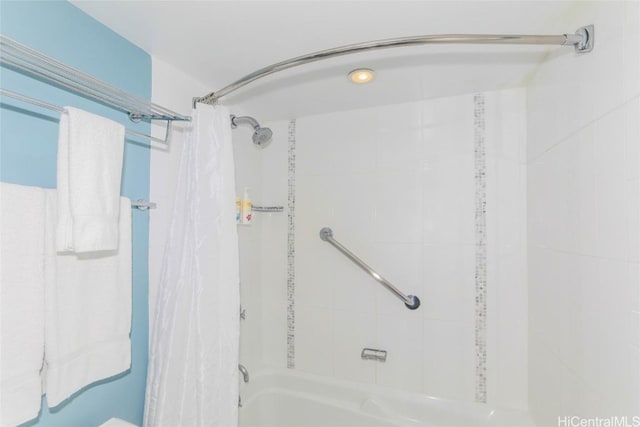 full bathroom with shower / bath combo with shower curtain