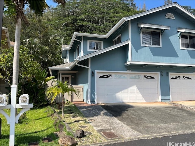 view of front of house featuring driveway and an attached garage