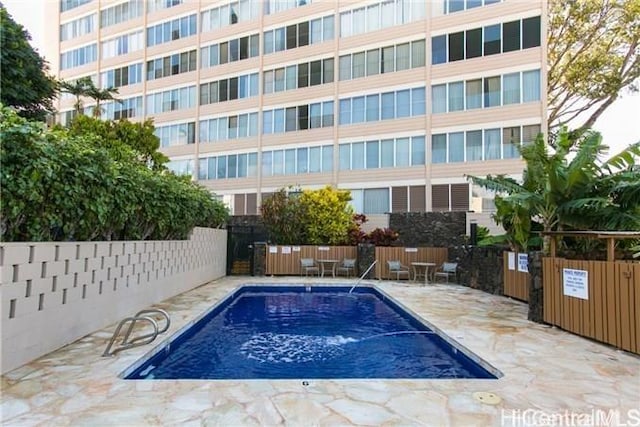 1550 Wilder Ave Unit A804, Honolulu, HI 96822 - community pool with a patio and fence