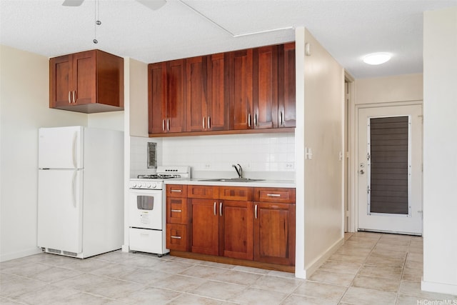 1550 Wilder Ave Unit A804, Honolulu, HI 96822 - kitchen featuring white appliances, a sink, light countertops, tasteful backsplash, and a ceiling fan